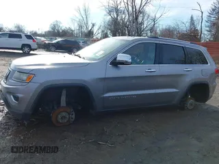 2016 Jeep Grand Cherokee Limited 75th Anniversary with VIN 1C4RJFBG4GC381622, listed as a IAAI auction lot 41211897 with Not Provided miles and . Bid and sale history available at DreamBid. Image 13.