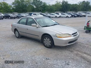 1999 Honda Accord LX z VIN JHMCG5647XC006403, wystawiony jako IAAI lot #42366237 z przebiegiem 193 037 mil mil oraz . Historia ofert i sprzedaży dostępna na DreamBid. Obrazek 1.