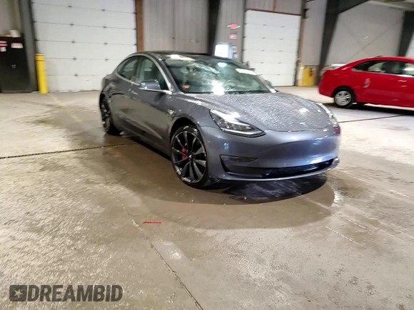 2020 Tesla Model 3 Performance z VIN 5YJ3E1EC8LF640891, wystawiony jako Copart lot #52377615 z przebiegiem 77 343 mil mil oraz Szkoda całkowita • Salvage title. Historia ofert i sprzedaży dostępna na DreamBid. Obrazek 10.