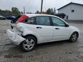 2004 Ford Focus with VIN 3FAFP37Z94R101447, listed as a Copart auction lot 74570054 with 162,166 mi miles and Salvage title. Bid and sale history available at DreamBid. Image 3.