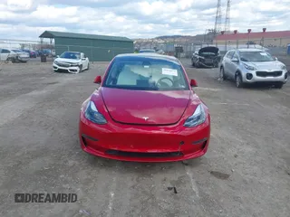 2021 Tesla Model 3 Long Range with VIN 5YJ3E1EB0MF902833, listed as a IAAI auction lot 41854474 with 41,982 mi miles and . Bid and sale history available at DreamBid. Image 12.