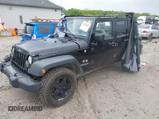 2008 Jeep Wrangler Unlimited X with VIN 1J4GA39108L501130, listed as a IAAI auction lot 42182601 with 177,507 mi miles and . Bid and sale history available at DreamBid. Image 2.