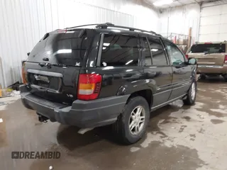 2004 Jeep Grand Cherokee Laredo with VIN 1J4GW48N84C367215, listed as a IAAI auction lot 41352098 with 165,485 mi miles and . Bid and sale history available at DreamBid. Image 4.