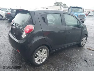 2014 Chevrolet Spark LT with VIN KL8CD6S90EC554007, listed as a IAAI auction lot 41065931 with 115,036 mi miles. Bid and sale history available at carsss.com. Image 4.