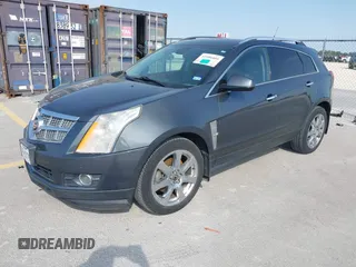 2011 Cadillac SRX Premium Collection with VIN 3GYFNFEY9BS601541, listed as a IAAI auction lot 41950409 with 168,358 mi miles. Bid and sale history available at carsss.com. Image 2.