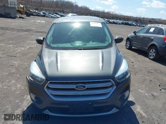 2017 Ford Escape SE with VIN 1FMCU9GD5HUC17297, listed as a IAAI auction lot 41880013 with 57,737 mi miles and . Bid and sale history available at DreamBid. Image 12.