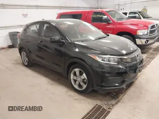 2019 Honda HR-V LX with VIN 3CZRU6H31KG734040, listed as a IAAI auction lot 42075333 with 94,410 mi miles. Bid and sale history available at carsss.com. Image 1.