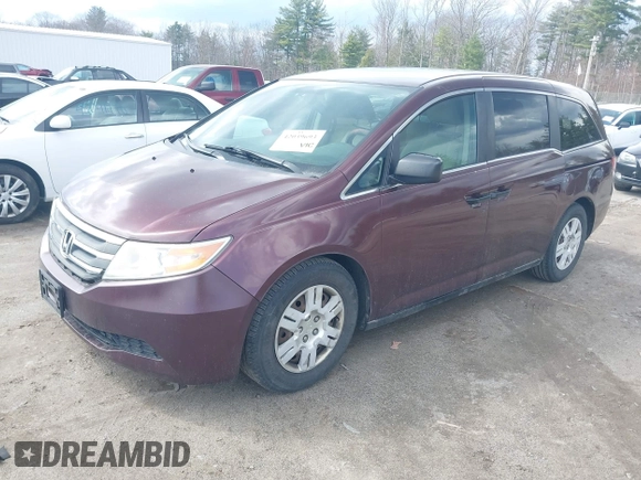 2013 Honda Odyssey LX with VIN 5FNRL5H26DB010444, listed as a IAAI auction lot 42039693 with 173,863 mi miles and . Bid and sale history available at carsss.com. Image 2.