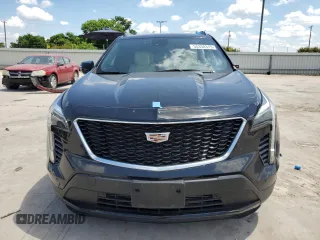 2021 Cadillac XT4 AWD Sport with VIN 1GYFZFR43MF054379, listed as a Copart auction lot 55338315 with 53,693 mi miles and Salvage title. Bid and sale history available at DreamBid. Image 5.