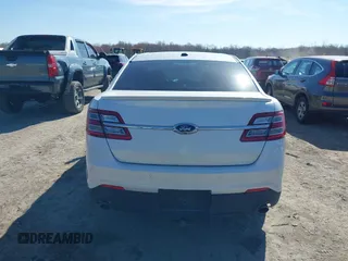 2014 Ford Taurus SEL z VIN 1FAHP2E81EG104137, wystawiony jako IAAI lot #42054432 z przebiegiem 146 046 mil mil oraz . Historia ofert i sprzedaży dostępna na DreamBid. Obrazek 16.