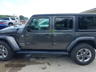 2022 Jeep Wrangler Unlimited Sahara Altitude z VIN 1C4HJXEG6NW103779, wystawiony jako IAAI lot #42563826 z przebiegiem 79 315 mil mil oraz . Historia ofert i sprzedaży dostępna na DreamBid. Obrazek 14.