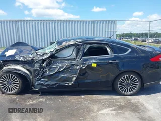 2018 Ford Fusion Titanium with VIN 3FA6P0RU8JR101306, listed as a IAAI auction lot 42542847 with 193,874 mi miles and . Bid and sale history available at DreamBid. Image 14.