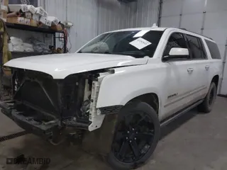 2016 GMC Yukon XL Denali with VIN 1GKS2HKJ0GR179318, listed as a IAAI auction lot 41292952 with 163,636 mi miles. Bid and sale history available at carsss.com. Image 2.