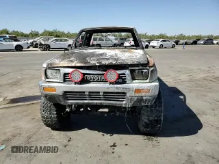 1991 Toyota Pickup DLX z VIN JT4VN13D7M5045456, wystawiony jako Copart lot #77028624 z przebiegiem Nie podano mil oraz Nie do naprawy • Non repairable. Historia ofert i sprzedaży dostępna na DreamBid. Obrazek 11.