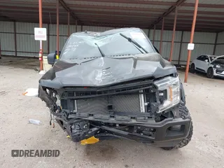 2020 Ford F-150 XL with VIN 1FTEW1E5XLKF16129, listed as a IAAI auction lot 42121449 with Not provided miles and . Bid and sale history available at DreamBid. Image 12.