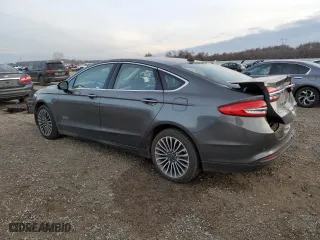 2017 Ford Fusion Energi SE with VIN 3FA6P0PU3HR354658, listed as a Copart auction lot 71824902 with 67,618 mi miles. Bid and sale history available at carsss.com. Image 2.