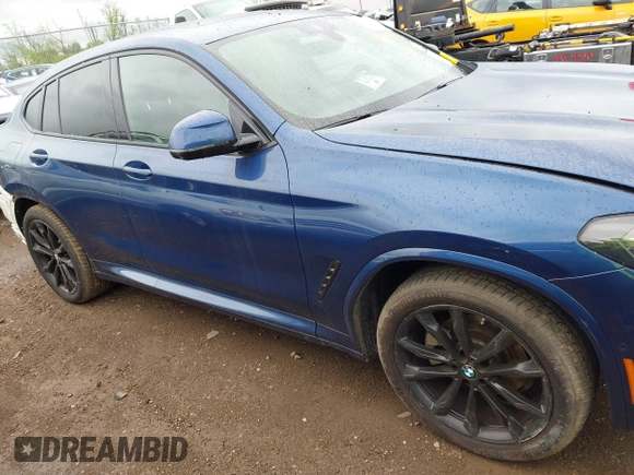 2023 BMW X4 xDrive30i z VIN 5UX33DT01P9P86340, wystawiony jako IAAI lot #42113558 z przebiegiem 27 226 mil mil oraz . Historia ofert i sprzedaży dostępna na DreamBid. Obrazek 14.