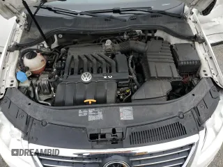 2008 Volkswagen Passat z VIN WVWCU73C58P028217, wystawiony jako Copart lot #52451275 z przebiegiem 70 829 mil mil oraz Szkoda całkowita • Salvage title. Historia ofert i sprzedaży dostępna na DreamBid. Obrazek 12.