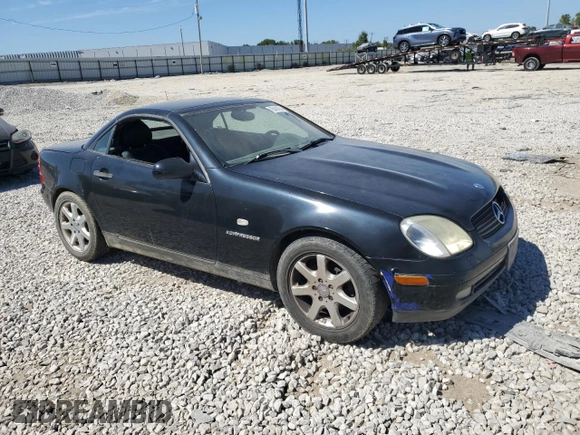 1999 Mercedes-Benz SLK-Class with VIN WDBKK47F8XF124253, listed as a Copart auction lot 70414014 with 0 mi miles and Salvage Title. Bid and sale history available at carsss.com. Image 4.