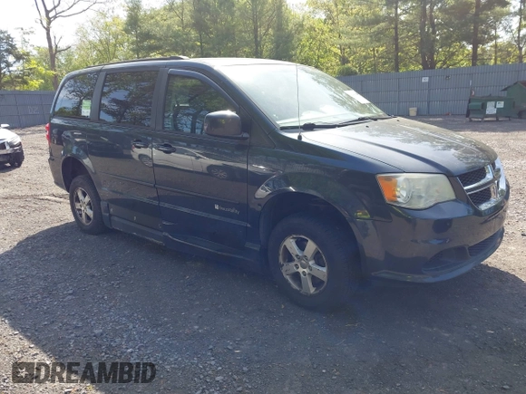 2013 Dodge Grand Caravan SXT with VIN 2C4RDGCG4DR636798, listed as a IAAI auction lot 42240550 with 96,100 mi miles and . Bid and sale history available at DreamBid. Image 1.