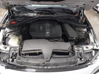 2014 BMW 3 Series 328d xDrive with VIN WBA3D5C55EF147308, listed as a IAAI auction lot 41499435 with 104,941 mi miles. Bid and sale history available at carsss.com. Image 10.