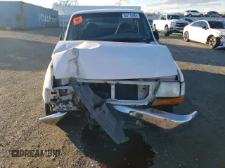 1999 Ford Ranger XLT with VIN 1FTYR10X8XUB20062, listed as a Copart auction lot 85779884 with 104,741 mi miles and Salvage title. Bid and sale history available at DreamBid. Image 5.
