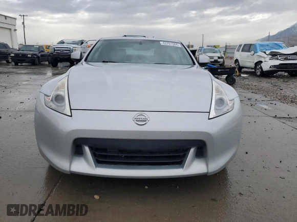 2009 Nissan 370Z Touring with VIN JN1AZ44E89M409220, listed as a Copart auction lot 43701504 with 145,099 mi miles and Salvage Title. Bid and sale history available at carsss.com. Image 5.