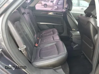 2014 Lincoln MKZ z VIN 3LN6L2G97ER822718, wystawiony jako Copart lot #55264075 z przebiegiem 141 738 mil mil oraz Szkoda całkowita • Salvage title. Historia ofert i sprzedaży dostępna na DreamBid. Obrazek 10.