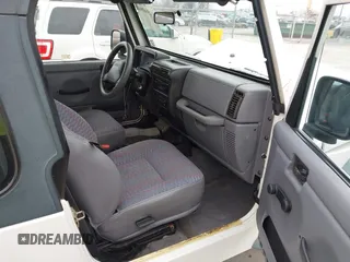 1998 Jeep Wrangler SE with VIN 1J4FY29P9WP793260, listed as a IAAI auction lot 41596990 with 90,766 mi miles. Bid and sale history available at carsss.com. Image 5.