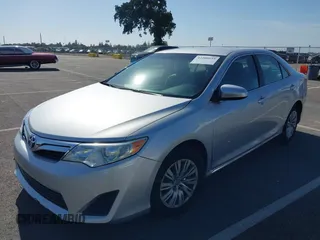 2014 Toyota Camry L with VIN 4T4BF1FK5ER442960, listed as a IAAI auction lot 42206639 with 119,639 mi miles and . Bid and sale history available at DreamBid. Image 2.