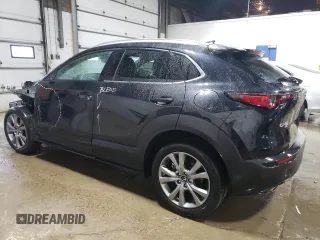 2024 Mazda CX-30 S Premium with VIN 3MVDMBDMXRM674650, listed as a Copart auction lot 54231405 with 7,428 mi miles and Non repairable. Bid and sale history available at DreamBid. Image 2.