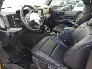 2023 Ford Bronco with VIN 1FMDE5CP1PLA92944, listed as a Copart auction lot 66625304 with 115,179 mi miles and Salvage title. Bid and sale history available at DreamBid. Image 7.