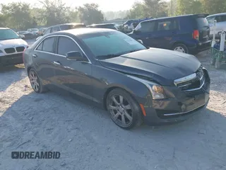 2015 Cadillac ATS Sedan Luxury RWD with VIN 1G6AB5RX4F0122156, listed as a IAAI auction lot 42012891 with 137,879 mi miles. Bid and sale history available at carsss.com. Image 1.