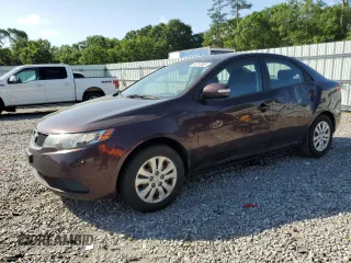 2010 Kia Forte EX z VIN KNAFU4A28A5854757, wystawiony jako Copart lot #54257065 z przebiegiem 180 099 mil mil oraz Szkoda całkowita • Salvage title. Historia ofert i sprzedaży dostępna na DreamBid. Obrazek 1.