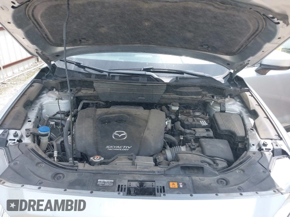 2018 Mazda CX-5 Grand Touring with VIN JM3KFADM6J0339185, listed as a IAAI auction lot 42160763 with 86,312 mi miles and . Bid and sale history available at DreamBid. Image 10.