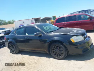 2014 Dodge Avenger SE with VIN 1C3CDZAB1EN133550, listed as a IAAI auction lot 42033001 with 137,592 mi miles. Bid and sale history available at carsss.com. Image 13.