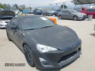 2015 Scion FR-S with VIN JF1ZNAA12F8712371, listed as a IAAI auction lot 42019465 with 21 mi miles. Bid and sale history available at carsss.com. Image 1.