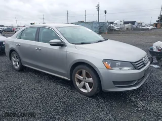 2014 Volkswagen Passat Wolfsburg Ed with VIN 1VWAT7A33EC060225, listed as a IAAI auction lot 41818949 with 163,545 mi miles. Bid and sale history available at carsss.com. Image 1.