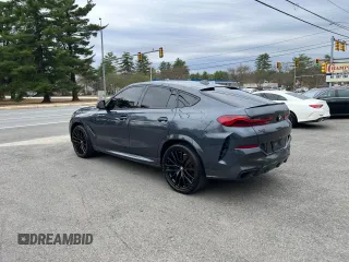 2021 BMW X6 sDrive40i z VIN 5UXCY4C05M9H19479, wystawiony jako Copart lot #54268205 z przebiegiem 85 899 mil mil oraz Czysty tytuł • Clean title. Historia ofert i sprzedaży dostępna na DreamBid. Obrazek 3.