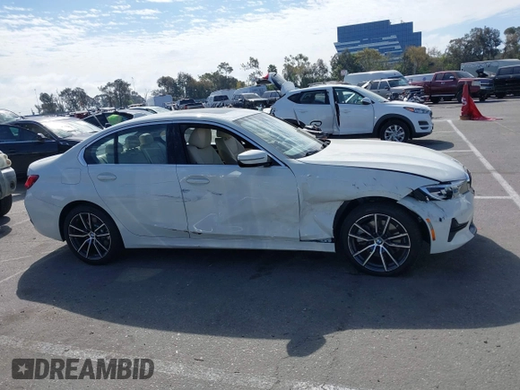 2019 BMW 3 Series 330i with VIN WBA5R1C55KAK12332, listed as a IAAI auction lot 41692035 with 13,657 mi miles and . Bid and sale history available at DreamBid. Image 13.