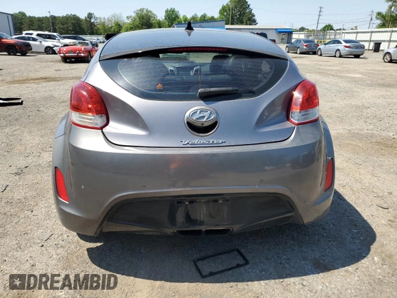 2016 Hyundai Veloster z VIN KMHTC6AD4GU273160, wystawiony jako Copart lot #52107985 z przebiegiem 120 884 mil mil oraz Szkoda całkowita • Salvage title. Historia ofert i sprzedaży dostępna na DreamBid. Obrazek 6.
