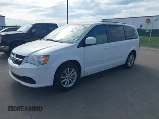 2016 Dodge Grand Caravan SXT with VIN 2C4RDGCG9GR380632, listed as a IAAI auction lot 42239479 with 197,316 mi miles and . Bid and sale history available at DreamBid. Image 17.