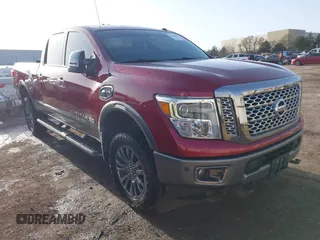 2017 Nissan Titan Pro-4X z VIN 1N6BA1F43HN562377, wystawiony jako IAAI lot #41786607 z przebiegiem 95 207 mil mil oraz . Historia ofert i sprzedaży dostępna na DreamBid. Obrazek 1.