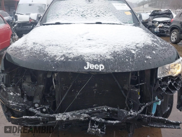 2021 Jeep Grand Cherokee 80th Anniversary with VIN 1C4RJFBG4MC510082, listed as a IAAI auction lot 41072125 with 55,610 mi miles and . Bid and sale history available at DreamBid. Image 6.