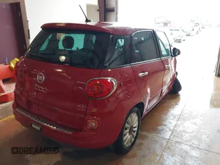 2015 FIAT 500L Easy with VIN ZFBCFABH4FZ031733, listed as a IAAI auction lot 40058070 with 79,801 mi miles and . Bid and sale history available at DreamBid. Image 4.