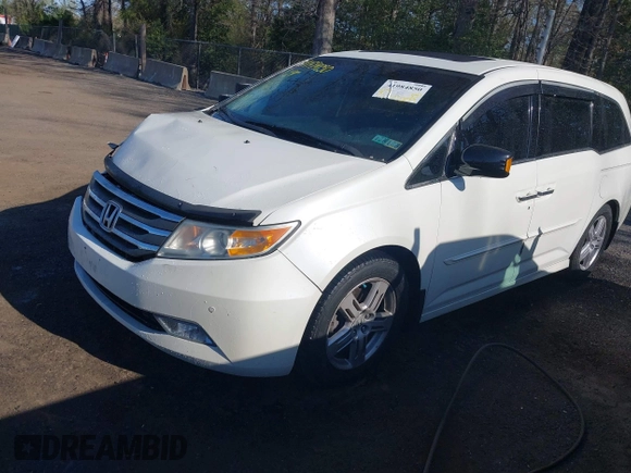 2012 Honda Odyssey Touring with VIN 5FNRL5H93CB146753, listed as a IAAI auction lot 41984850 with 155,309 mi miles and . Bid and sale history available at DreamBid. Image 2.