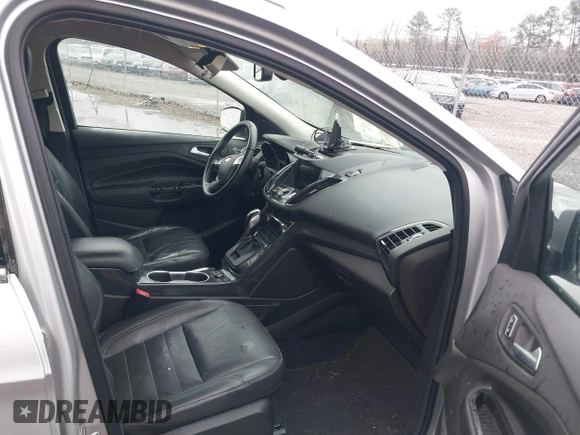 2016 Ford Escape Titanium with VIN 1FMCU0JX7GUB25573, listed as a IAAI auction lot 41871980 with 157,525 mi miles. Bid and sale history available at carsss.com. Image 5.
