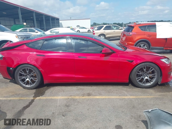 2021 Tesla Model S Plaid z VIN 5YJSA1E69MF439987, wystawiony jako IAAI lot #42496725 z przebiegiem 25 mil mil oraz . Historia ofert i sprzedaży dostępna na DreamBid. Obrazek 13.