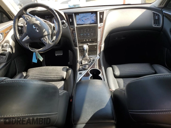 2015 Infiniti Q50 Premium with VIN JN1BV7AR8FM401557, listed as a Copart auction lot 54860485 with 71,214 mi miles and Salvage title. Bid and sale history available at DreamBid. Image 8.