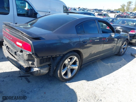 2013 Dodge Charger SXT Plus with VIN 2C3CDXHG3DH654962, listed as a IAAI auction lot 41464690 with 234,241 mi miles. Bid and sale history available at carsss.com. Image 4.